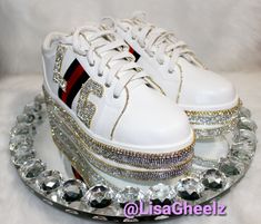 The Italy sneakers are constructed of rhinestones and gold rhinestone trim. You also have the option to add your initials. The double stacked bottom trimming of the shoe is embellished with rhinestones. These are some of the most amazing sneakers you will ever see, wear, or own!!! The pictures you see here does not do the actual heels justice. These shoes are great all occasions. If you want a pair of sneakers that will turn heads no matter when you wear them then look no further. This design ca Initial A, Rhinestone Trim, Gold Rhinestone, Stella Mccartney Elyse, The Double, Wedding Sneaker, Women's Shoes Sandals, Wedding Shoe, Shoes Sandals