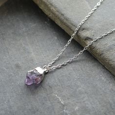 "This Dainty Amethyst necklace is made from raw Amethyst with a sterling silver electroplated top and loop. As the gemstones are a natural product size and shape varies from charm to charm 12-16 mm approx. in height (including loop) Each one will be unique. The chain and clasp are also sterling silver. Available in 14\", 15\", 16\", 17\" or 18 inch chain length. A lovely gift for a February birthday. Your necklace will arrive in a gift box." Moonstone Teardrop Necklace, Celtic Necklace, February Birthday, Nature Necklace, Raw Amethyst, Garnet Pendant, Birthstone Pendant, Moonstone Necklace, Amethyst Necklace