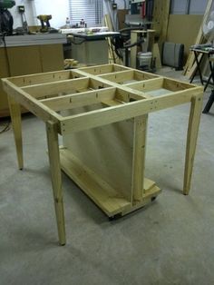 a workbench made out of wood in a workshop