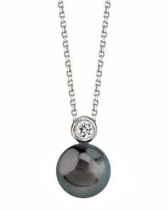 This exquisite pendant features an 12-13mm AAA quality Tahitian South Sea cultured pearl mounted on the finest 18K gold with a dazzling 0.2 Carat SI clarity diamond. The approximate height for the pendant is 0.5 inches.
The pendant is packaged in a beautiful jewelry gift box, perfect for gifting. Tahitian Pearl Pendant, White Gold Chains, Sea Pearl, Sea Pearls, Tahitian Pearls, Yellow Gold Chain, South Sea Pearls, Pearl Diamond, Pearl Size