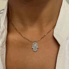 This Majestic Hamsa Pendant Necklace Features Prong Set Baguette Cut Diamonds With An Outline Of Round Brilliant Cut Diamonds. Total Diamond Weight: 0.59 Carat. The Pendant Is Crafted In 14k White Gold And The Paperclip Link Chain Comes In 14k Yellow Gold. Diamond Color G-H And Si Clarity. Pendant Size: 17x13mm. Chain Length: 16.5 Inches. Comes With A Presentable Gift Box. Id: 02124 Gift Diamond Chain Necklace With Single Cut Diamonds, Diamond Chain Necklace With Single Cut Diamonds As Gift, Dainty White Baguette Diamond Jewelry, Dainty White Jewelry With Baguette Diamonds, White Gold Chain Necklace With Diamond Accents As Gift, 14k Gold Fine Jewelry Chain Necklace With Diamond Accents, 14k Gold Chain Necklace With Diamond Accents, 14k Gold Jewelry With Silver Baguette Diamonds, 14k White Gold Necklace With Baguette Cut