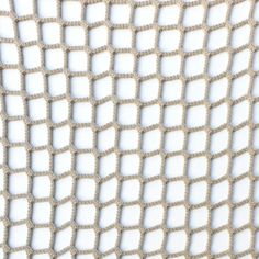 a close up view of a white net