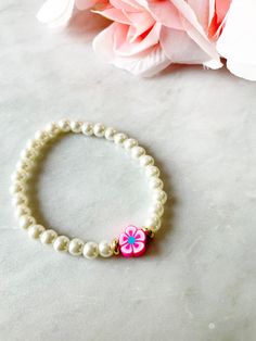 Pearl Flower Bracelet. Beaded Pearl Bracelet. Pink Flower - Etsy Adjustable Pearl Bracelet With Flower Shape, Adjustable Flower Pearl Bracelets, Adjustable Flower-shaped Pearl Bracelets, Adjustable Flower-shaped Pearl Bracelet, Adjustable Flower Pearl Bracelet, Blue Flower Bracelet, Gold Pearl Jewelry, Floral Bracelet, Floral Jewelry