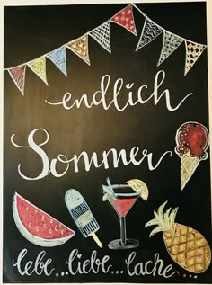 a chalkboard sign that says, endlech sommer