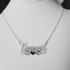 -Carmen Handmade Item. -Style: Brush Finish  -Material:  Solid 925 Sterling Silver. -Purity: Silver .925 - Link type: Figaro. -Clasp: Lobster claw. -Thickness Chains: 2.5mm. -Necklace length available: (16", 17", 18", 19", 20",21, 22"). (The name pendant is included in necklace length measurement. The necklace is laid  straight and measured end to end.) - Nameplate Letters: (Max 9 letters). Please First letter upper case and rest lower case. -Pendant Bar Measured: 1.50" Long x 0.50" Wide (38mm W Silver Hallmarked Nameplate Jewelry, Silver Sterling Engraved Name Necklace, White Gold Sterling Silver Name Necklace With Hallmarks, Silver Hallmarked Name Necklace For Anniversary, Sterling Silver Necklace With Hallmarks, Silver Engraved Name Necklace For Anniversary, Handmade Sterling Silver Name Necklace For Valentine's Day, Silver Sterling Name Necklace With Heart Pendant, Silver Sterling Heart Pendant Name Necklace