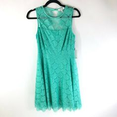 Kensie Dress A Line Sleeveless Lace Overlay Open Back Aqua Green Size 4 New With Tags! Comes From A Smoke Free Home. Feel Free To Ask Any Questions You May Have. Thanks For Looking! Green Sleeveless Lined Mini Dress, Stretch Sleeveless Lace Mini Dress, Casual Sleeveless Lace Dress, Baby Blue Dresses, Black Striped Dress, Dress Zipper, Lace Midi Dress, Knit Sweater Dress, Aqua Green