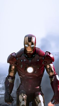 an iron man standing in front of a mountain