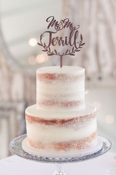 a wedding cake with a no more terrible sign on top