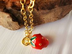 Check out this item in my Etsy shop https://www.etsy.com/listing/799448449/red-strawberry-necklace-gold-strawberry Cute Fruit Design Jewelry For Gifts, Cute Fruit Design Jewelry As Gift, Strawberry Jewelry, Gold Fruit, Iolite Necklace, Iolite Jewelry, Delicate Silver Necklace, Blue Gemstone Necklace, Strawberry Necklace