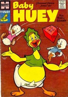 an old comic book with cartoon characters on the cover and in front of it, baby huey