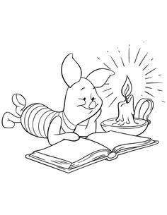 winnie the pooh reading a book while laying on her stomach with a candle in it