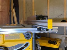 a table saw sits on top of a work bench