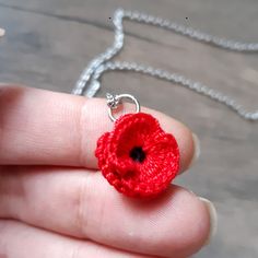 Crochet pendant hand-woven with 100% cotton perle thread. A small Poppy flower held by a light and resistant 50cm Stainless Steel chain. If you want a flower in another color, write to me, I will be happy to create a personalized ad for you. Handmade Red Flower Necklace Adjustable, Handmade Red Flower Necklace With Adjustable Fit, Handmade Adjustable Red Flower Necklace, Handmade Red Flower Necklace, Red Crochet Jewelry As A Gift, Gift Red Crochet Jewelry, Red Crochet Jewelry Gift, Red Crochet Jewelry For Gift, Adjustable Crochet Flower Necklace