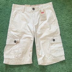 Levi’s Size 10 Light Tan Nwt! White Cargo Shorts For Spring, Spring White Cargo Shorts, White Cargo Shorts With Pockets, Casual White Cargo Shorts, White Cargo Shorts With Side Pockets For Spring, White Cotton Cargo Shorts With Pockets, Levi's White Casual Shorts, Casual White Levi's Shorts, White Cotton Cargo Shorts With Built-in Shorts