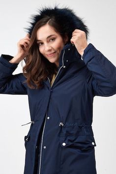 Women's Hooded Puffer Parka Coat In Blue The women's hooded puffer parka coat in blue offers a perfect blend of warmth and sophistication for winter. Made from durable 100% polyester with a soft viscose lining, this parka is designed to keep you cozy while looking stylish. Featuring a hooded collar, zip closure with button overlay, and open hem cuffs, it provides optimal comfort against the cold. With two inside and two side pockets for added practicality, this blue parka is an essential outerwear piece for chilly days. Outer Shell: 100% Polyester Inner Shell: Viscose Lining Feature: Parka Coat With Hood Closure Style: Zipper With Buttons Collar Style: Hooded Cuffs Style: Open Hem Inside Pockets: Two Outside Pockets: Two Side Pockets Color: Blue Blue Parka, Thermal Jacket, Leather Jumpsuit, Puffer Parka, Shearling Vest, Studded Jacket, Distressed Jacket, Waterproof Coat, Suede Coat