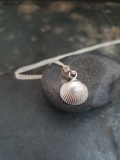 Tiny shell on a necklace, sterling silver. Proces: During a walk on the beach of Vlieland, one of the Wadden Islands, I found this tiny shell. I made a cast of it in 925 sterling silver. Measurements: The shell has a prox diameter of 1 cm. You can chose from a variety of lengths for the necklace. It is also possible to order the shell without a necklace. Materials: Sterling silver Packaging: All items are carefully wrapped in a gift box and a handmade linnen envelop. Shipping and insurance: I of Cast Of It, Heart Soap, Silver Packaging, Walk On The Beach, Linen Bag, Jewelry Maker, Necklace Sterling Silver, Walk On, Custom Rings