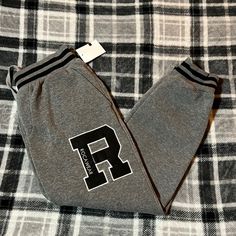 Brand New Never Worn Gray Sports Pants With Ribbed Cuffs, Gray Sporty Winter Bottoms, Gray Sporty Bottoms For Winter, Gray Leisure Pants For Winter, Gray Winter Leisure Pants, Gray Sports Bottoms For Fall, Gray Joggers With Ribbed Cuffs For Fall, Sporty Gray Pants With Ribbed Cuffs, Gray Ribbed Cuffs Joggers For Fall