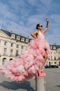 Glamorous and gorgeous pink custom-made prom dress. Accented with delicate lace appliques, the sleeveless bodice boasts illusion halter plunging V neckline. The luxury ruffled tulle high-low skirt finishes off the look. Tulle Tiered Dress, High Low Dress Formal, Custom Made Prom Dress, Fancy Frocks, Pink Prom Dress, Pink Prom, Prom Formal, Pink Tulle, Pageant Dresses