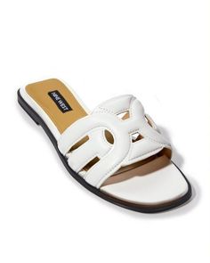 Simply slip on this comfy slide sandal and go, with its flat heel, lightly padded sole, and stylish faux leather upper. Perfect for pairing with your favorite bottoms or a chic sundress. This versatile shoe is a wardrobe must-have in neutral to colorful hues. | Boston Proper - White - Slide Sandal - 9.0 Modern Slip-on Summer Flats, White Cushioned Flats For Summer, Chic Slip-on Slippers For Summer, Modern Summer Slip-on Flats, Modern Slip-on Flats For Summer, Trendy White Open Toe Flats, Chic Flat Slides With Cushioned Footbed, Chic Slide Slippers For Vacation, Chic Cushioned Flat Slides