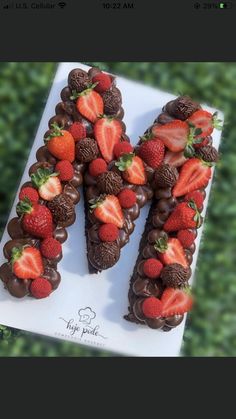 chocolate covered strawberries are arranged into the letter n