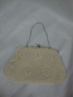 "Vintage Bags by Dormar Japan cream beaded evening bag with beautiful cream floral beading in within circular beading with brass top clasp and silver chain top handle and comes with mirror, comb and (2) kerchiefs as shown. Purse and kerchiefs has wear/tear, several exterior stains and interior purse pocket rust stains per photos, and purse is  8\" bottom width by 5\" body height by 6\" chain height. If you choose to arrange to have an item shipped please make sure to insure the shipment as we ar Formal Beaded Cream Evening Bag, Formal Cream Beaded Evening Bag, Cream Beaded Evening Bag, Cream Beaded Bags For Vintage Events, Beaded Cream Bags For Vintage Events, Handmade Cream Evening Bag, Formal Cream Handmade Evening Bag, Exterior Stain, Chain Top