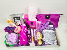 a purple bag filled with lots of items