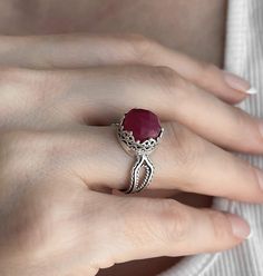 Looking for the perfect gift for your loved one? Look no further than this stunning silver filigree art women's cocktail ring. With its intricate details and beautiful face-up design, this ring is sure to make an impression. Featuring a double-side faceted checkerboard round-cut ruby corundum gemstone measuring 10 mm and 0.47" / 12.00 mm in face size, it looks absolutely gorgeous when worn. This exquisite piece comes complete with a velvet pouch, silver polish cloth, and a luxurious gift box, ma Elegant Open Ruby Ring With Stone Setting, Elegant Carved Jewelry For Promise Ring, Elegant Carved White Gold Rings, Elegant Carved Sterling Silver Rings, Elegant Party Ruby Ring, Sterling Silver Ruby Ring For Formal Occasions, Handmade Elegant Sterling Silver Ruby Ring, Handmade Elegant Ruby Ring In Sterling Silver, Elegant Handmade Ruby Open Ring