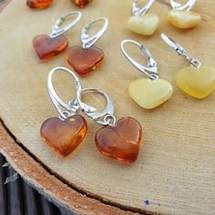 Welcome to handmade Baltic Amber jewelry shop. This Item is made of genuine, natural Amber. This item will make You look simple but gorgeous. Small Amber heart shape earrings. Natural Baltic Amber. Handmade heart earring. Small lever back earring made of real gemstone.   Weight: ~ 1-2  gr  Length: ~  3 cm Our handmade jewelry is made with passion and love. If you have any problems with your order please contact us. Please note that colors can vary from originals depending on computer monitor's settings. Due to amber is being unique and natural gemstone, each item may be slightly different in shades or shapes. Items may have natural imperfections like lines and spots, specks, coloration and inclusions, layers and lines .  All amber is fossilized tree resin and it is extremely light gemstone Nickel-free Heart Earrings For Her, Round Earrings With Heart Charm As A Gift, Teardrop Heart Charm Earrings For Gift, Teardrop Earrings With Heart Charm For Gift, Handmade Heart-shaped Earrings For Her, Handmade Heart-shaped Earrings, Gift Teardrop Earrings With Heart Charm, Handmade Heart-shaped Earrings As A Gift For Her, Dainty Teardrop Heart Earrings For Gift