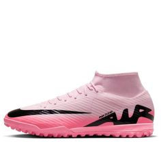 the nike merance soccer shoe in pink and black is featured on a white background