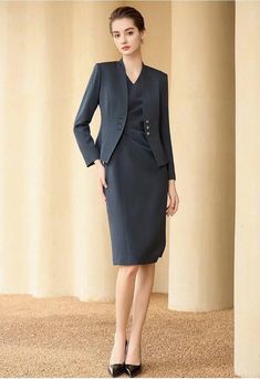 Look and feel your best in the office with this elegant business dress suit. Featuring a dress and blazer designed for business wear, this suit helps you make an impression and bolster your professional image—the perfect choice for the modern, working woman. Dress and Blazer V-Neck, Long sleeves blazer Side button dress; Sleeveless dress and knee-length Structured shoulders. POLYESTER 99% SPANDEX 1% LINING: POLYESTER 100% Imported Brand - AS/WQ® Model Number - 233025C1, 233025Q1 Womens Business Professional, Business Professional Dress, Working Dresses, Womens Business, True Freedom, Skirt Suits, Tan Dress, Dark Blue Dress, Business Dress