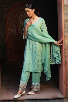 Aqua green kurta with floral butti embroidery using resham, cutdana, zari, pearls and sequins work. Paired with a pant with embroidered hem and dupatta with embroidered buttis. - Aza Fashions Green Traditional Wear With Gota Work For Spring, Spring Green Traditional Wear With Gota Work, Fitted Green Palazzo Set With Floral Embroidery, Green Gota Work Dupatta For Spring, Green Georgette Palazzo Set With Floral Embroidery, Green Floral Embroidery Georgette Palazzo Set, Fitted Pista Green Palazzo Set With Floral Embroidery, Green Salwar Kameez With Floral Embroidery For Reception, Traditional Dupatta For Spring Reception