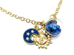 "A made to order sun, moon and stars charm pendant necklace with your choice of star and moon colors. Sturdy 5 mm cable chain with a rhinestone accent on the end can be adjusted up to 20\" Charms range from 15-20 mm Want a different length? Let us know what you need at checkout. Shorter lengths are at no cost. Longer chains may incur an additional charge. US SHIPPING: US orders over $35 or for 3 or more items ship free via first class mail. Orders over $150 receive a free priority mail upgrade. Sun Moon And Stars, Star Charm Necklace, Star And Moon, Sun Moon Stars, Gold Sun, Gold And Silver Rings, Charm Pendant Necklace, Moon And Stars, Moon Stars