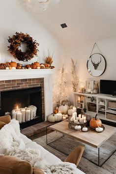 a living room filled with furniture and a fire place