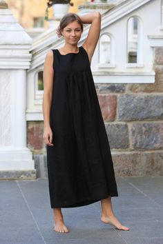 "Handcrafted Oeko-Tex Standard certified 100% European linen smock dress ideal for everyday wear. Perfect for springtime or chilly summer days. Always dress to kill! Silhouette: A-line Length: ±47\"/120cm (we can make adjustments) Sleeves: no Pockets: side seam Details: *Colour shown: black *Model is wearing size M *Medium weight *Maternity-friendly *Relaxed fit *Not-ironed (and no need to) *Handmade by @LinenCloud Easy care: - Machine wash gentle - Wash seperately or with similar colours - Tumb Casual Linen Maxi Dress For Daywear, Casual Maxi Length Linen Dress For Daywear, Casual Linen Maxi Sundress, Black Sleeveless Linen Dress For Spring, Sleeveless Black Linen Dress For Spring, Black Sleeveless Linen Dress For Summer, Black Sleeveless Midi Dress With Relaxed Fit, Sleeveless Unlined Linen Day Dress, Sleeveless Unlined Linen Dress For Daywear