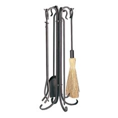 a black coat rack with two brooms and a duster on top of it