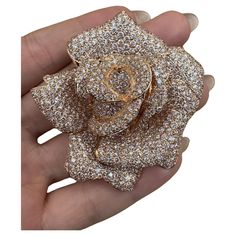 Large Diamond Rose Brooch/Pin/Pendant 22.00 Carat Total Weight in 18k Rose Gold Large Flower Brooch in 18k Rose Gold features 22.15 carats of Round Brilliant Diamonds pave-set in 18k Rose Gold. The diamonds are bright and lively. This versatile piece serves as a Pin, Brooch, and Pendant all in one. It has a double bar attachment with safety and a hidden bale on the back side. Brooch measures 2.50 inches across and 2.25 inches down. Brooch weighs 52 grams. Marked 750, D22.15. BUY WITH CONFIDENCE Luxury Rose-colored Jewelry For Anniversary, Luxury Rose Jewelry For Anniversary, Luxury Rose Design Jewelry For Anniversary, Rose Gold Jewelry With Roses For Formal Occasions, Luxury Diamond Jewelry With Rose Design, Elegant Rose Design Brooches For Anniversary, Elegant Rose Gold Brooches For Anniversary, Luxury Rose Gold Flower Jewelry, Formal Gold Brooch With Rose Design