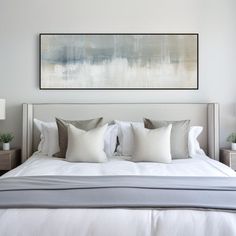 a bed with white sheets and pillows in front of a large painting on the wall