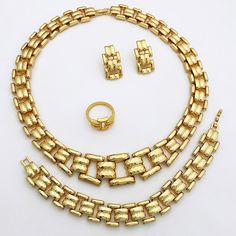 Afraic Jewelry -Dubai Gold Color Jewelry Sets Cuban Necklace And Earrings For Women Classic Chain Wedding Party Banquet Jewelry product name: Latest jewelry set designs for women material: alloy keyword: Dubai Gold Color Jewelry Sets For Women Style: African fashion jewelry set For Women Style: TRENDY Shape\pattern: Round Origin: Mainland China Occasion: Party Model Number: JP-251 Metals Type: Zinc alloy Material: Metal MOQ: 1set Jewelry Sets Type: Necklace/Earrings/Ring/Bracelet Item Type: Jewelry Sets Included Additional Item Description: Necklace Bangle Ring Earrings Set Gender: Women Fine or Fashion: Fashion Electroplating process: Three times in the plating Color: Dubai Gold Color Jewelry Sets Model Number:3256804187805048 Product information: Material: alloy Color: Gold Product Packa Cuban Necklace, Jewelry Set Design, Set Designs, Bangle Ring, Color Jewelry, Fashion Jewelry Sets, Latest Jewellery, Necklace And Earrings, Fashion Jewelry Necklaces