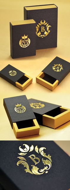 three different boxes with gold designs on them