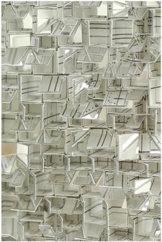 an abstract glass wall with many different shapes and sizes