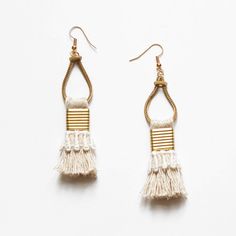 These light weight statement earrings are composed of handmade beige fringe tassels with vintage hand dyed lace and pure brass metal components. A boho tassel earring that is authentically unique. The lace trimming comes in black, white, terracotta (rusty brick), mustard (ochre yellow), beige (sand), Desert rose (dusty pink), magenta (beetroot pink), burgundy (red wine), navy (dark blue), teal (dark turquoise), evergreen (dark emerald) or Dark moss (army green). --------------------------------- Summer Fringe Chandelier Drop Earrings, Elegant Summer Chandelier Earrings With Tassels, Elegant Summer Tassel Chandelier Earrings, Summer Fringe Dangle Chandelier Earrings, Beige Bohemian Fringe Earrings, Handmade White Bohemian Tassel Earrings, White Bohemian Fringe Earrings, Bohemian Adjustable Macrame Tassel Earrings, Handmade Beige Drop Earrings