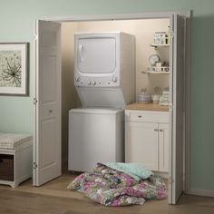 a washer and dryer in a small room