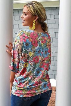 Multicolor Floral Print V Neck Half Sleeve Blouse Vibrant Print V-neck Top For Brunch, Colorful V-neck Blouse For Beach, Colorful V-neck Blouse For Vacation, Colorful V-neck Top For Vacation, Summer V-neck Tops With Multicolor Print, Spring V-neck Top With Colorful Pattern, Vibrant Print Tops For Vacation, Multicolor Print Top For Fall Day Out, Multicolor Blouse For Vacation