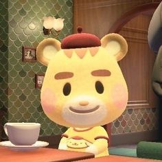 an animal crossing character sitting at a table with a cup and saucer in front of him