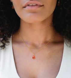 "* Genuine Carnelian Pendant in Sterling Silver or 14k Gold Filled * Harness the potent energy of Carnelian! Carnelian is the orange variety of Quartz that's known for its ability to stoke creativity, foster positivity, and stimulate passion. This isn't just a necklace - it's a tool for transformation.  We hand select each triangular-shaped gem when crafting your one-of-a-kind necklace. Carnelian naturally ranges in color from orange to red and can be either solid in color, or with colorful band Carnelian Gemstone Drop Jewelry, Gold Carnelian Teardrop Jewelry, Orange Carnelian, Raw Crystal Jewelry, Carnelian Necklace, Gems Bracelet, Carnelian Pendant, Carnelian Stone, Teardrop Pendant