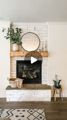 a living room with a white brick fireplace and potted plants on the mantel