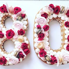 the letters o and o are decorated with flowers