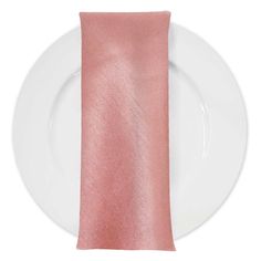 a white plate with a pink napkin on it