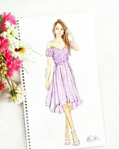 a drawing of a woman in a purple dress next to flowers and a notebook on a table