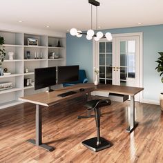 a computer desk sitting on top of a hard wood floor next to a book shelf